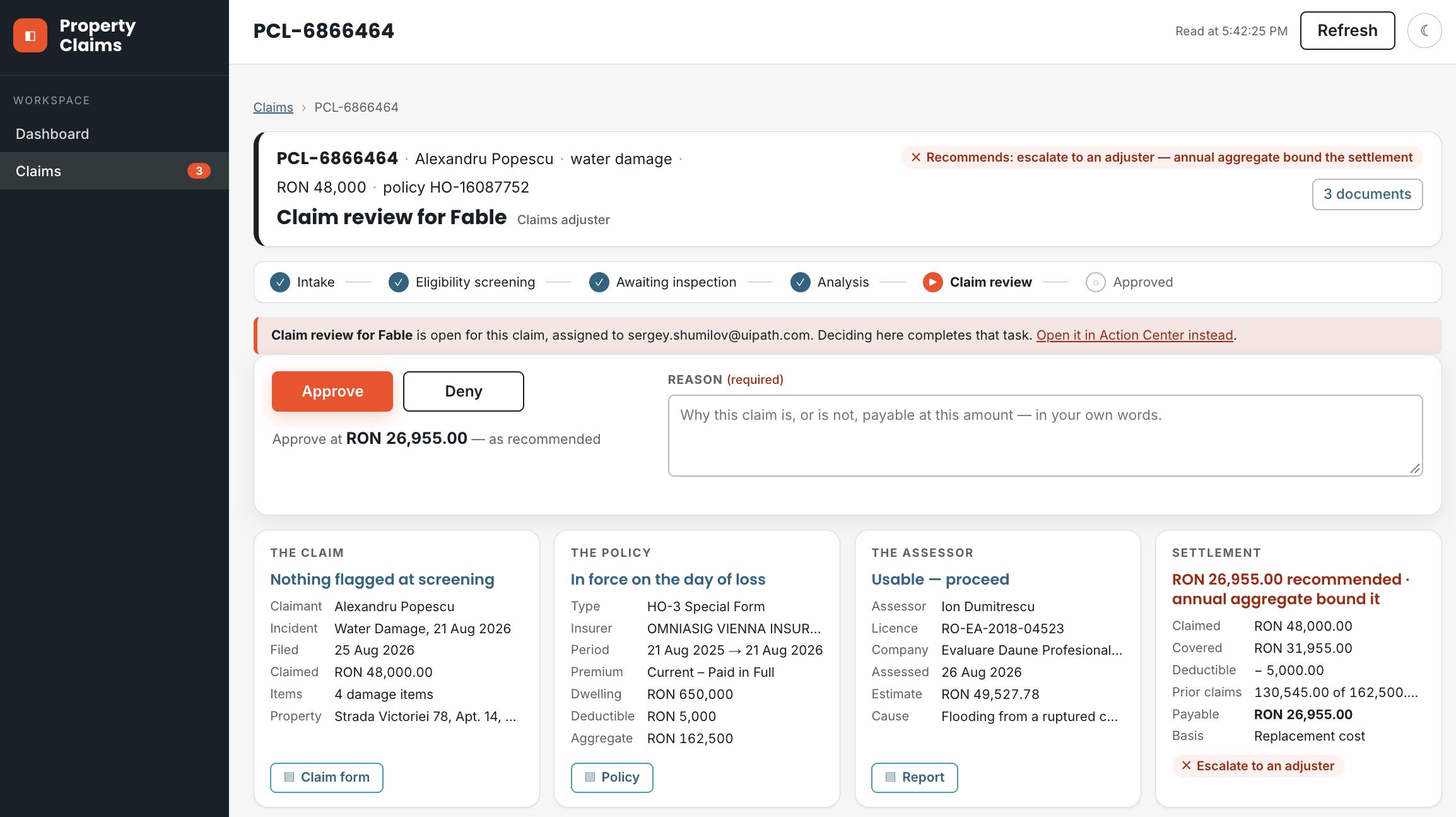 One claim in full on the Action App's own screen — header, stage strip, the four cards — with the claim review gate open, so the two outcomes and the required reason are live and the same task is linked in Action Center